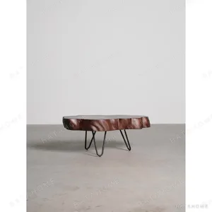 Live-Edge Solid Wood Slab Coffee Table on Hairpin Legs in clay — in a room setting