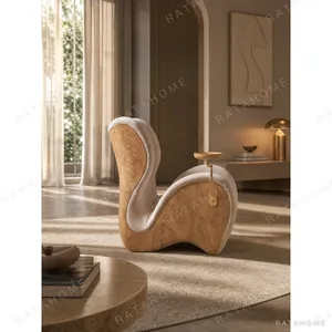 Turin Cigar Lounge Chair in oatmeal — in a room setting
