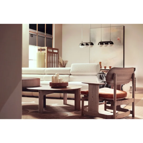 Smile Oak Lounge Chair with Curved Back and Side Tray in natural oak — in a room setting