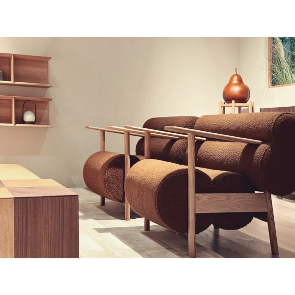 Smile Oak Lounge Chair with Curved Back and Side Tray in natural oak — in a room setting