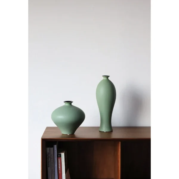 Song Aesthetic Ceramic Vases in olive — in a room setting