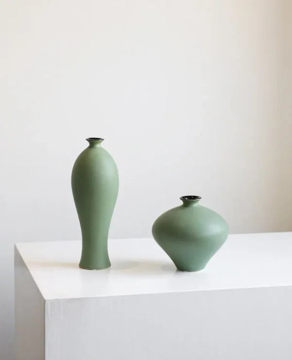 Song Aesthetic Ceramic Vases in olive — in a room setting