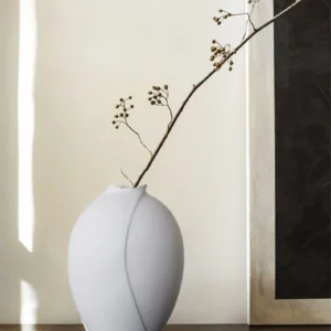 Song Aesthetic White Bloom Ceramic Vase, Medium in ivory — in a room setting