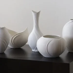 Song Aesthetic White Bloom Ceramic Vase, Medium in ivory — in a room setting