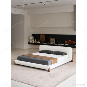 Softbay Shearling Bed with Walnut Feet in oatmeal — in a room setting