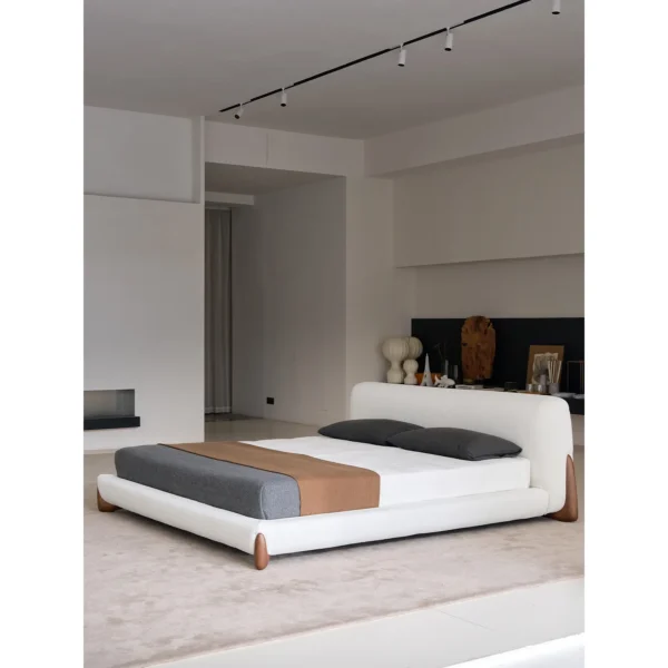 Softbay Shearling Bed with Walnut Feet in oatmeal — in a room setting