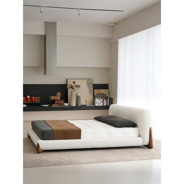Softbay Shearling Bed with Walnut Feet in oatmeal — in a room setting