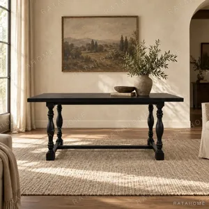 Spindle Black Long Table with Turned Legs and Stretcher in black — in a room setting