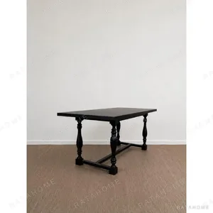 Spindle Black Long Table with Turned Legs and Stretcher in black — in a room setting
