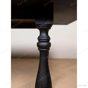 Spindle Black Long Table with Turned Legs and Stretcher in black — in a room setting