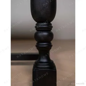 Spindle Black Long Table with Turned Legs and Stretcher in black — in a room setting