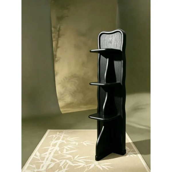 Spine Tall Bookshelf in Black — in a room setting