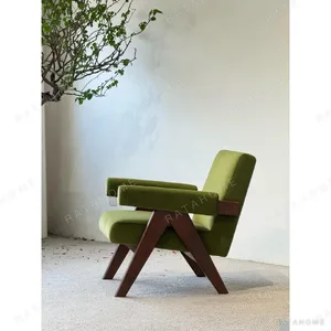 Mid-Century Walnut Armchair in Matcha Green Fabric — in a room setting