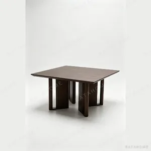 Square Ash Veneer Dining Table on Cross-Panel Base in walnut — in a room setting