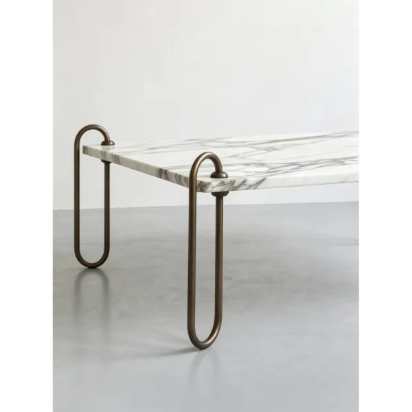 Rectangular Marble Coffee Table on Looped Brass Legs, 110 cm in ivory — in a room setting