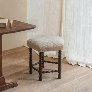 Star Shearling Stool with Turned Dark Wood Legs in oatmeal — front view