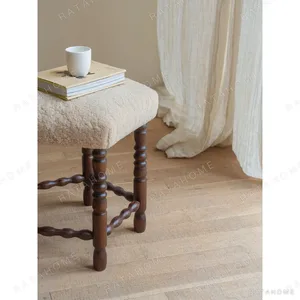 Star Shearling Stool with Turned Dark Wood Legs in oatmeal — in a room setting