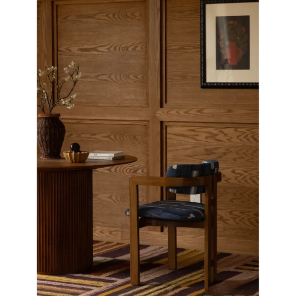 Starry Ash Dining Armchair in natural oak — in a room setting