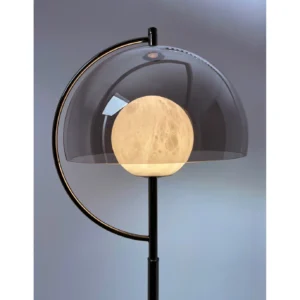 Stone Globe Floor Lamp with Smoked Half-Dome Shade in black — in a room setting