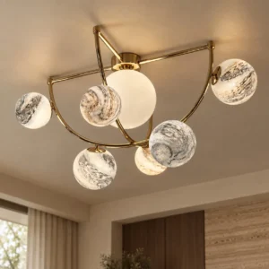 Stone Planet Orbit Flush Ceiling Light with Brass Arms in brushed brass — front view
