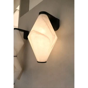 Alabaster-Look Double Diamond Wall Light on Black Bracket in oatmeal — in a room setting