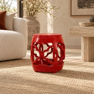 Red Glazed Ceramic Garden Stool with Pierced Cloud Pattern in red — front view