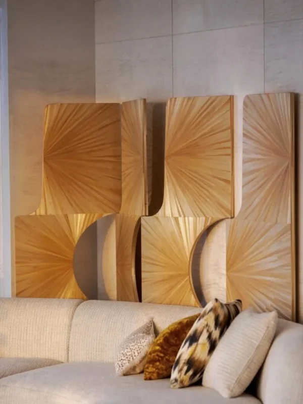 Straw Marquetry Three-Panel Art Screen in brushed brass — in a room setting