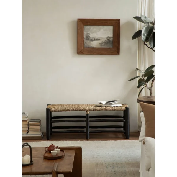 Straw Woven Bench with Turned Wood Legs in sand — in a room setting