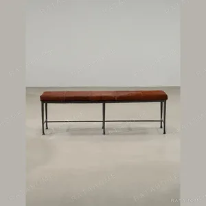 Sud Chestnut Hair-on-Hide Bench with Forged Iron Base in clay — in a room setting