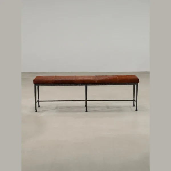 Sud Chestnut Hair-on-Hide Bench with Forged Iron Base in clay — in a room setting