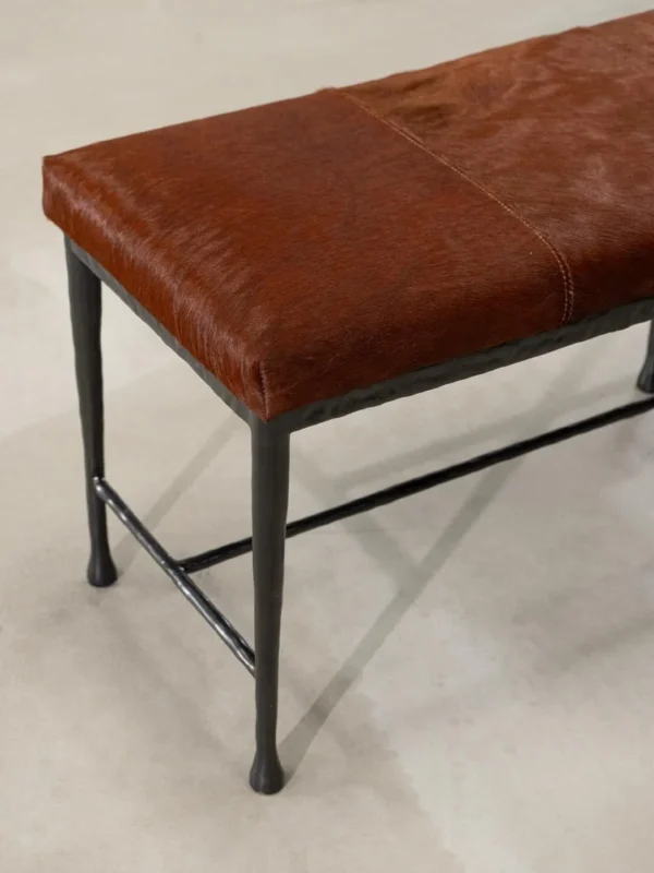 Sud Chestnut Hair-on-Hide Bench with Forged Iron Base in clay — detail
