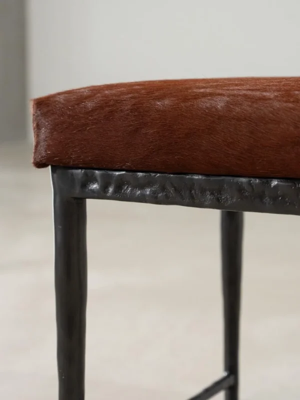 Sud Chestnut Hair-on-Hide Bench with Forged Iron Base in clay — detail