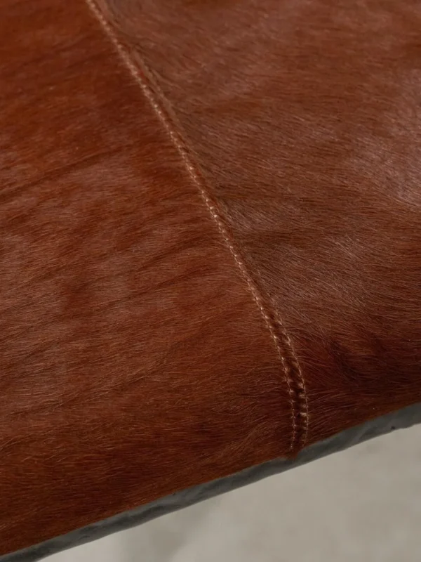 Sud Chestnut Hair-on-Hide Bench with Forged Iron Base in clay — detail