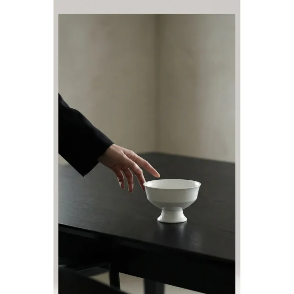 Artist Collaboration White Footed Dessert Cup in ivory — in a room setting