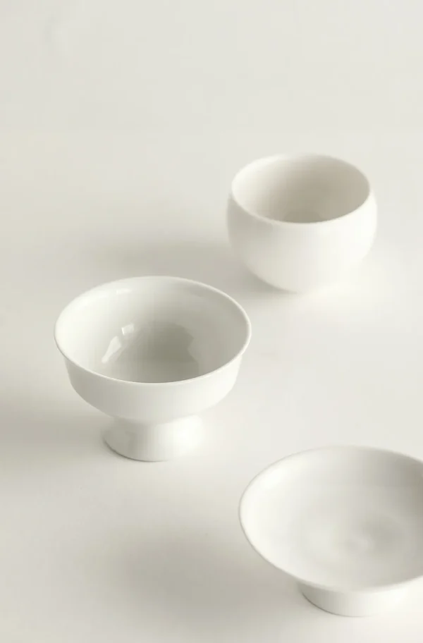 Artist Collaboration White Footed Dessert Cup in ivory — in a room setting