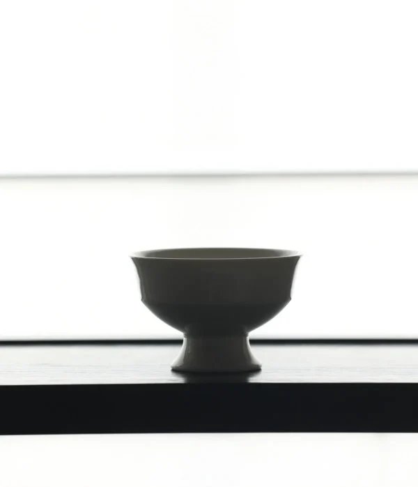 Artist Collaboration White Footed Dessert Cup in ivory — in a room setting