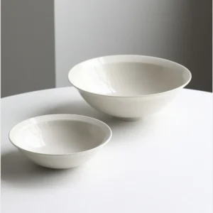 Artist Collaboration Flared Ceramic Bowls in Warm White — front view