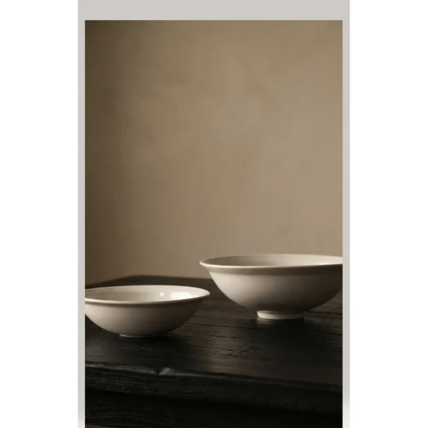 Artist Collaboration Flared Ceramic Bowls in Warm White — in a room setting