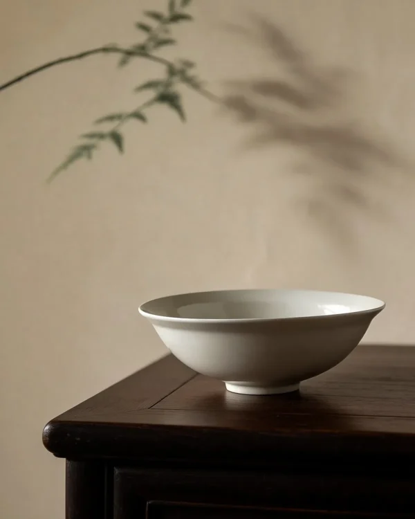 Artist Collaboration Flared Ceramic Bowls in Warm White — in a room setting