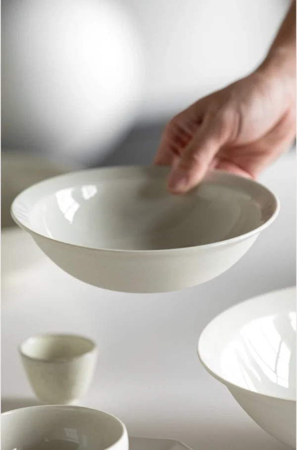 Artist Collaboration Plain Conical Deep Bowls, Three Sizes in ivory — in a room setting