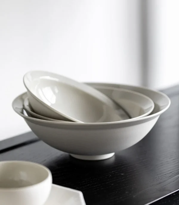 Artist Collaboration Plain Conical Deep Bowls, Three Sizes in ivory — in a room setting