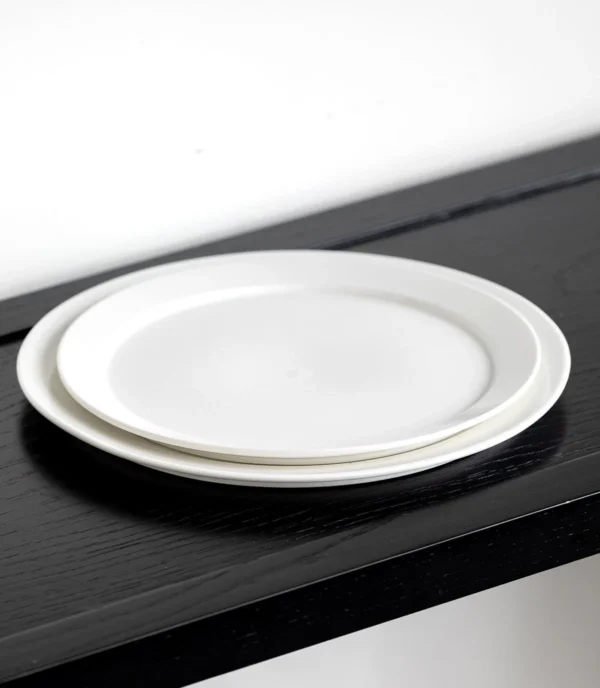 Artist Collaboration Minimalist White Porcelain Wide-Ring in ivory — in a room setting