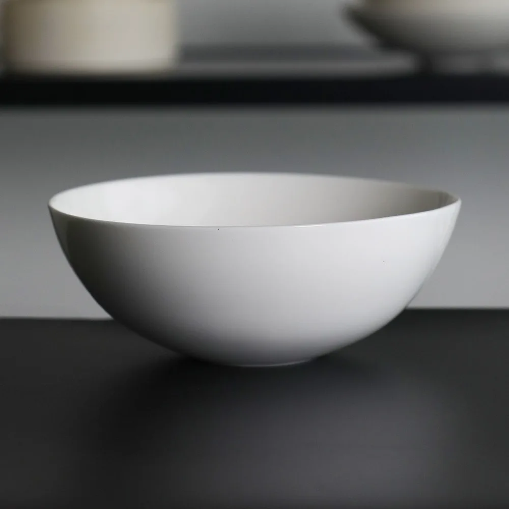 Artist Collaboration Pure White Ceramic Conical Bowl in ivory — front view