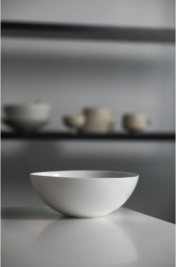Artist Collaboration Pure White Ceramic Conical Bowl in ivory — in a room setting