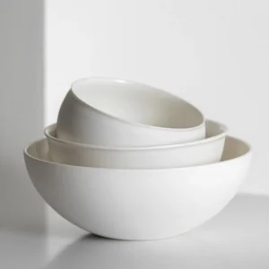 Artist Collaboration Soft-Glow White Porcelain Bowls and Cup in ivory — front view