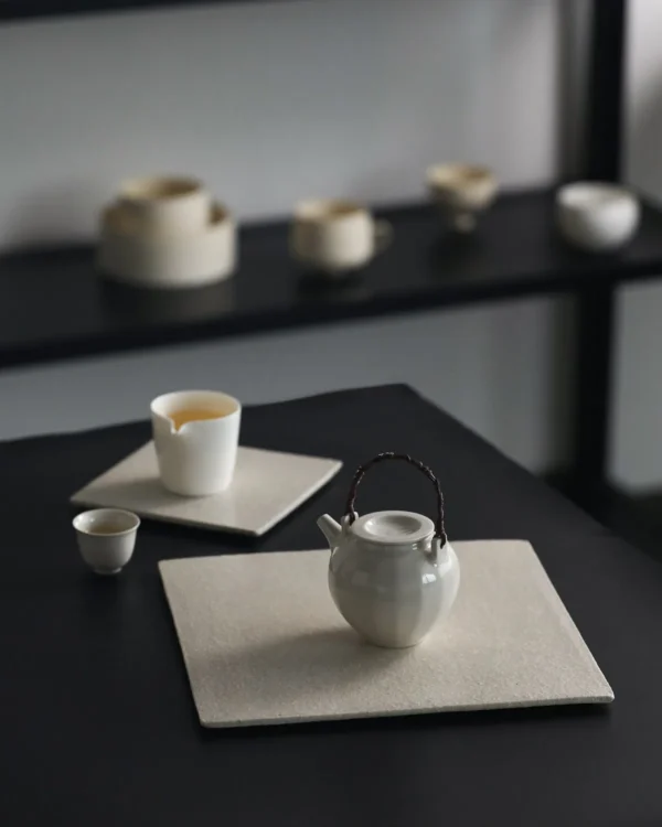 Artist Collaboration Square Stoneware Tea Tray, Small or in sand — in a room setting