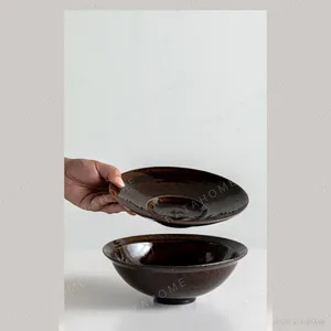 Artist Collaboration Soy-Brown Glaze Conical Bowl and in clay — in a room setting