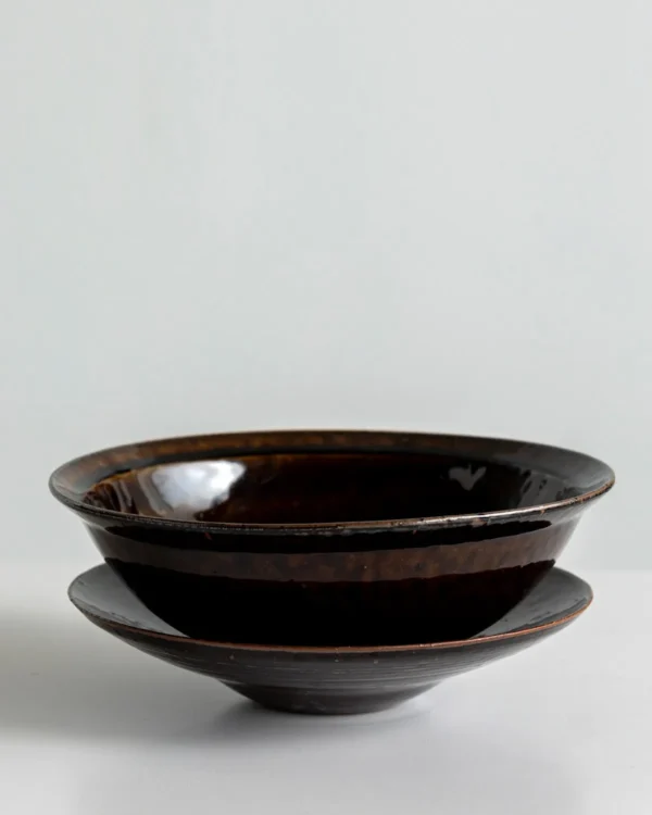 Artist Collaboration Soy-Brown Glaze Conical Bowl and in clay — in a room setting