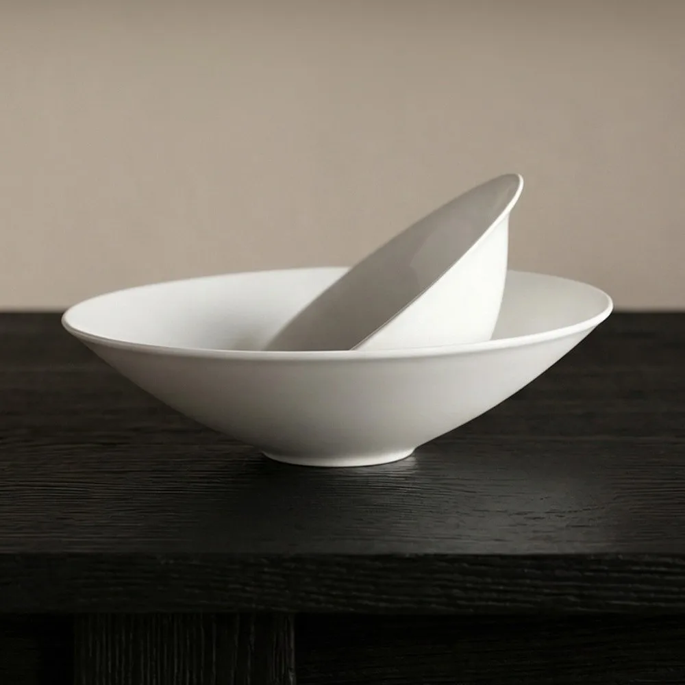 Artist Collaboration White Porcelain Conical Bowl and in ivory — front view
