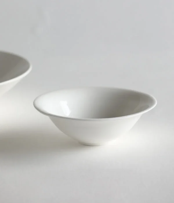 Artist Collaboration White Porcelain Conical Bowl and in ivory — in a room setting